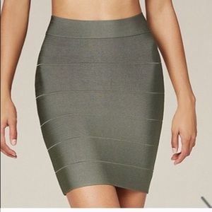 BEBE BANDAGE GREEN SKIRT